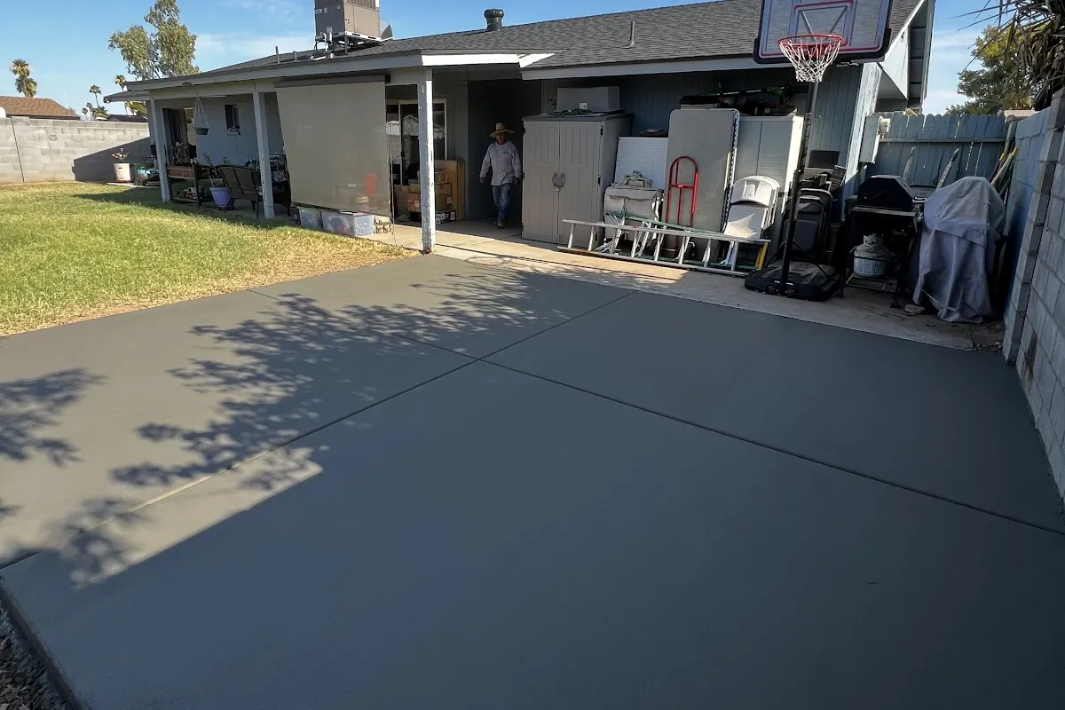 A large new backyard concrete slab poured by our featured contractor